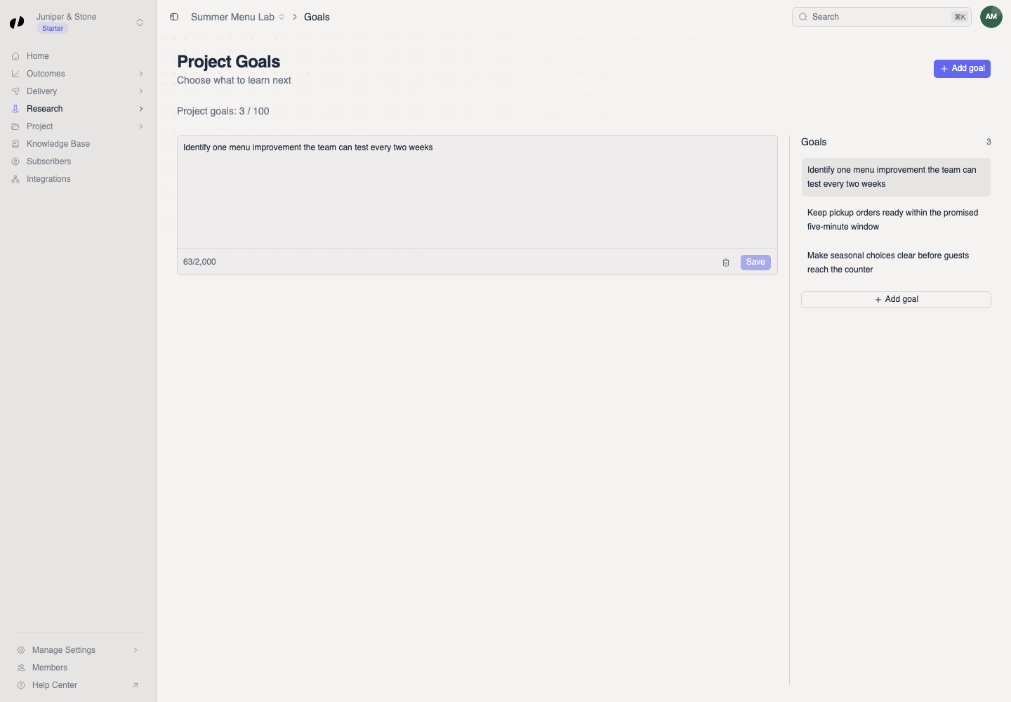 A saved research goal is selected from the Goals list and displayed in the editor.