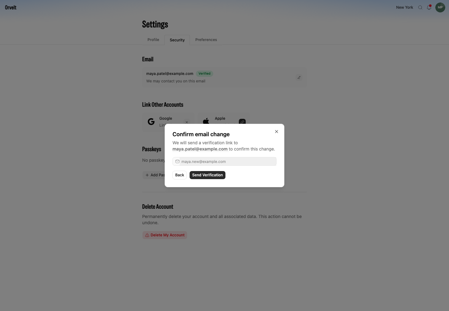 The Confirm email change dialog names the current address and offers Send Verification.